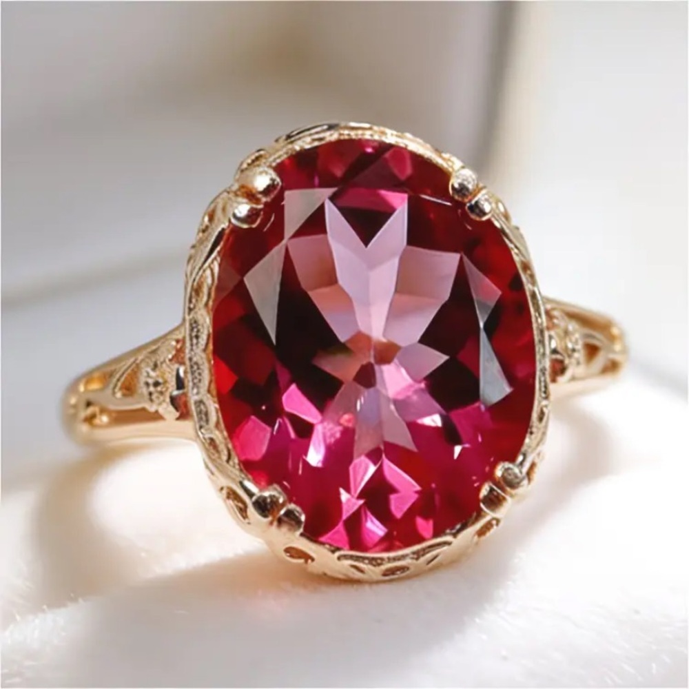 Vintage-Style Gold Tone Ring with Deep Pink Oval Stone